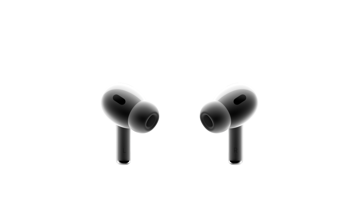 两只白色的 AirPods Pro 耳机面对面摆放，外形小巧，均配有黑色网罩，已安装硅胶耳塞。